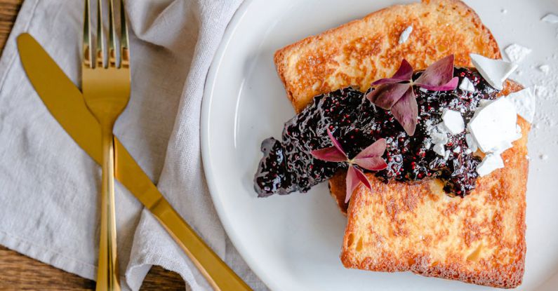 French Toast - A Plate of Delicious French Toast on a Wooden Surface