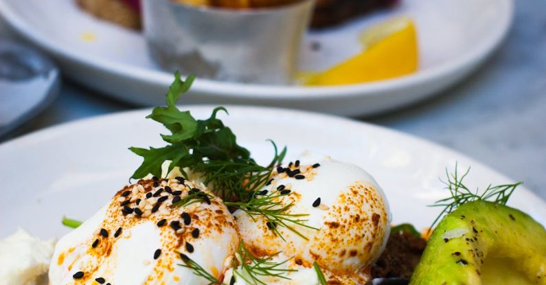 Poached Eggs - Cooked Dish on Ceramic Plates