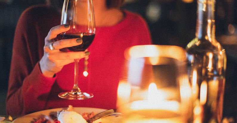 Dinner - Woman Holding Wine Glass Selective Focus Photography