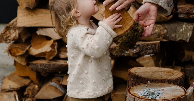 Gluten-Free - Little girl looking at father standing near firewood