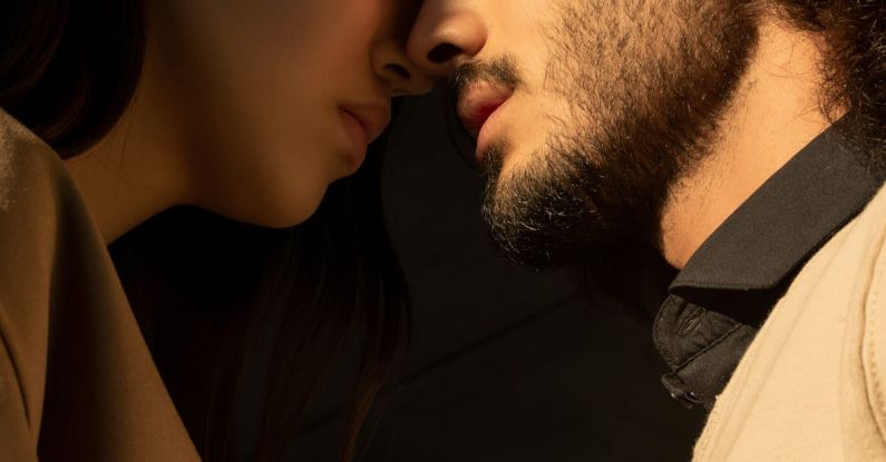 Middle Eastern - Man and Woman Closing Their Eyes