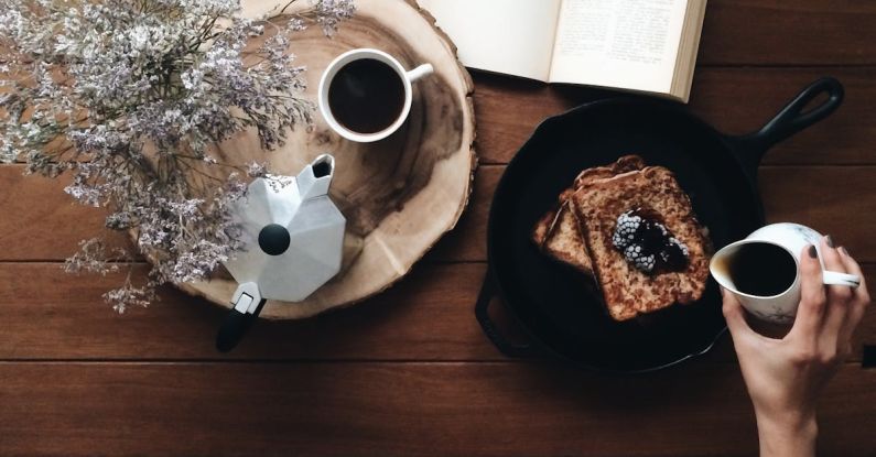 Comfort Foods - Crop woman with dessert and book