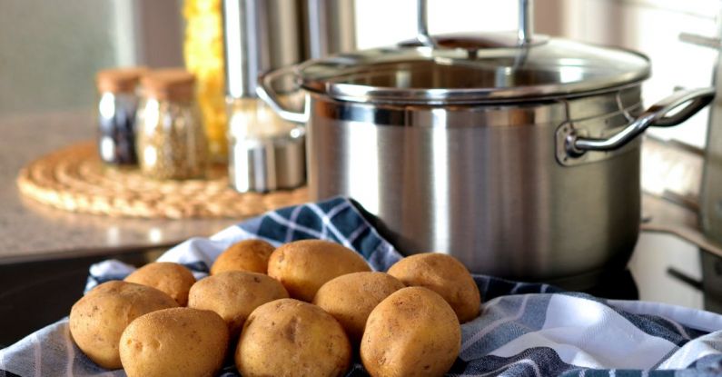 Mashed Potatoes - Potatoes Beside Stainless Steel Cooking Pot