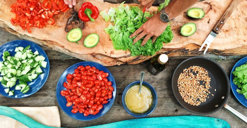 Vegetarian Meals - Person Holding Sliced Vegetable